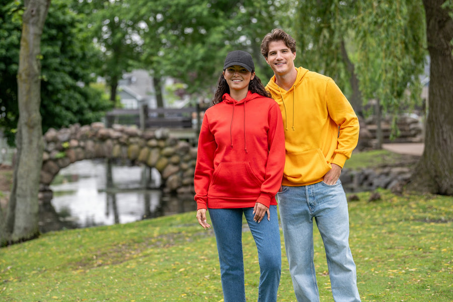 Two friends in red and gold Fundamental hoodies